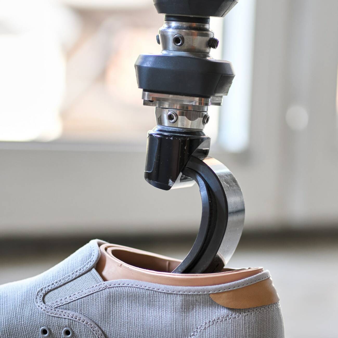 Prosthetic device in a shoe