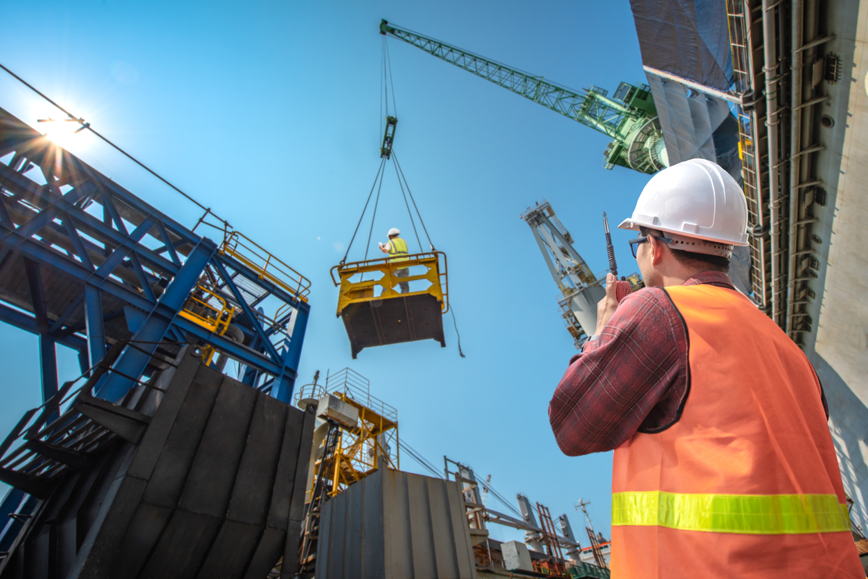 Photo of load master supervising work